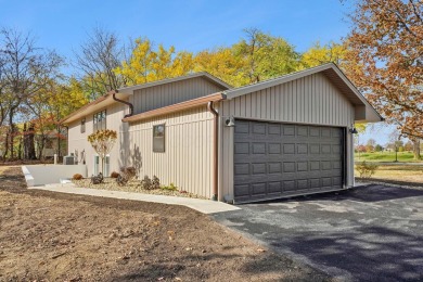 Nestled on a sprawling 1.5-acre lot  situated right across the on New Albany Links Golf Club in Ohio - for sale on GolfHomes.com, golf home, golf lot