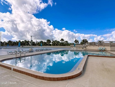 TRUE FLORIDA LIFESTYLE!!! Living in this building reflects what on Oceans Golf Club in Florida - for sale on GolfHomes.com, golf home, golf lot