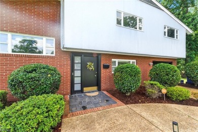 This stunning 4-bedroom, 3-bath home blends mid-century charm on James River Country Club in Virginia - for sale on GolfHomes.com, golf home, golf lot