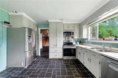 This stunning 4-bedroom, 3-bath home blends mid-century charm on James River Country Club in Virginia - for sale on GolfHomes.com, golf home, golf lot