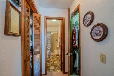 Enjoy stunning golf-front views of the #5 Fairway from the front on Bella Vista - Metfield Golf Complex and Country Club in Arkansas - for sale on GolfHomes.com, golf home, golf lot
