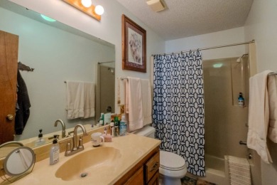 Enjoy stunning golf-front views of the #5 Fairway from the front on Bella Vista - Metfield Golf Complex and Country Club in Arkansas - for sale on GolfHomes.com, golf home, golf lot