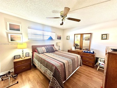 Enjoy relaxing garden  views from your screened in porch. The on Hollybrook Golf and Tennis Club  in Florida - for sale on GolfHomes.com, golf home, golf lot