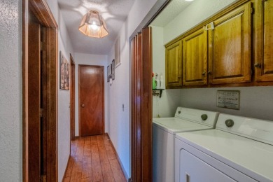 Enjoy stunning golf-front views of the #5 Fairway from the front on Bella Vista - Metfield Golf Complex and Country Club in Arkansas - for sale on GolfHomes.com, golf home, golf lot