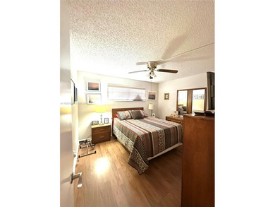 Enjoy relaxing garden  views from your screened in porch. The on Hollybrook Golf and Tennis Club  in Florida - for sale on GolfHomes.com, golf home, golf lot