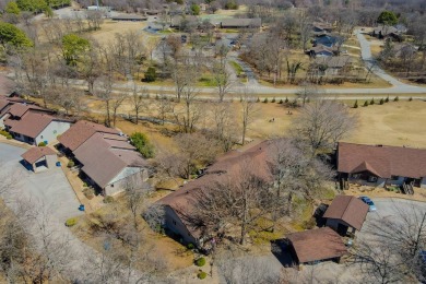 Enjoy stunning golf-front views of the #5 Fairway from the front on Bella Vista - Metfield Golf Complex and Country Club in Arkansas - for sale on GolfHomes.com, golf home, golf lot