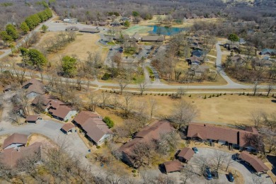 Enjoy stunning golf-front views of the #5 Fairway from the front on Bella Vista - Metfield Golf Complex and Country Club in Arkansas - for sale on GolfHomes.com, golf home, golf lot