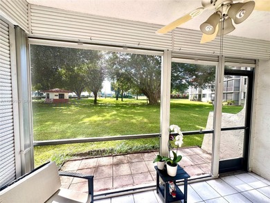 Enjoy relaxing garden  views from your screened in porch. The on Hollybrook Golf and Tennis Club  in Florida - for sale on GolfHomes.com, golf home, golf lot