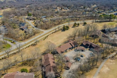 Enjoy stunning golf-front views of the #5 Fairway from the front on Bella Vista - Metfield Golf Complex and Country Club in Arkansas - for sale on GolfHomes.com, golf home, golf lot