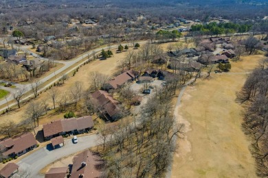 Enjoy stunning golf-front views of the #5 Fairway from the front on Bella Vista - Metfield Golf Complex and Country Club in Arkansas - for sale on GolfHomes.com, golf home, golf lot