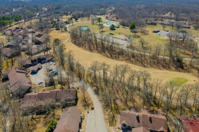 Enjoy stunning golf-front views of the #5 Fairway from the front on Bella Vista - Metfield Golf Complex and Country Club in Arkansas - for sale on GolfHomes.com, golf home, golf lot