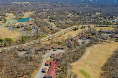 Enjoy stunning golf-front views of the #5 Fairway from the front on Bella Vista - Metfield Golf Complex and Country Club in Arkansas - for sale on GolfHomes.com, golf home, golf lot