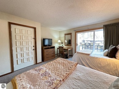 This welcoming and updated 2 bedroom 2 bath condo at Shanty on Shanty Creek Golf Course in Michigan - for sale on GolfHomes.com, golf home, golf lot