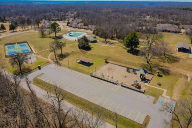 Enjoy stunning golf-front views of the #5 Fairway from the front on Bella Vista - Metfield Golf Complex and Country Club in Arkansas - for sale on GolfHomes.com, golf home, golf lot