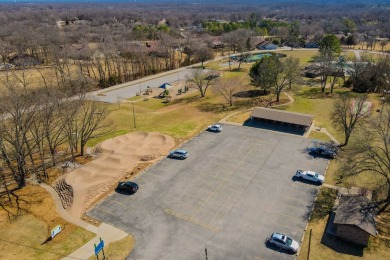Enjoy stunning golf-front views of the #5 Fairway from the front on Bella Vista - Metfield Golf Complex and Country Club in Arkansas - for sale on GolfHomes.com, golf home, golf lot