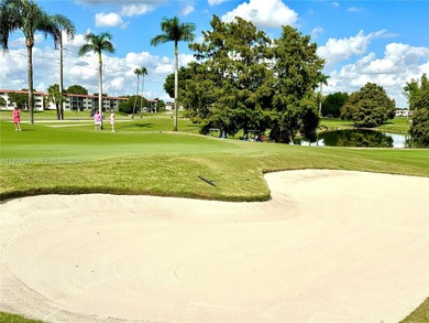 Enjoy relaxing garden  views from your screened in porch. The on Hollybrook Golf and Tennis Club  in Florida - for sale on GolfHomes.com, golf home, golf lot