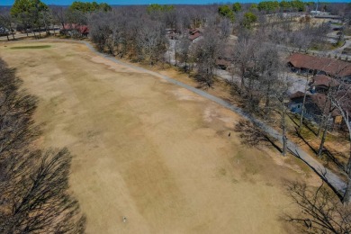 Enjoy stunning golf-front views of the #5 Fairway from the front on Bella Vista - Metfield Golf Complex and Country Club in Arkansas - for sale on GolfHomes.com, golf home, golf lot
