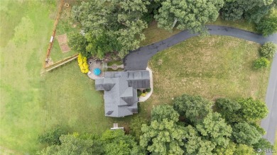 Nestled on the 17th fairway of Mill Quarter Golf Course, this on Mill Quarter Plantation Country Club in Virginia - for sale on GolfHomes.com, golf home, golf lot