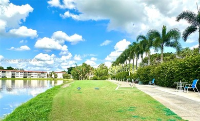 Enjoy relaxing garden  views from your screened in porch. The on Hollybrook Golf and Tennis Club  in Florida - for sale on GolfHomes.com, golf home, golf lot