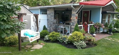 Lovely Cottage style living with 2 bedrooms, 2.5 baths! You must on Lake Tansi Village Country Club in Tennessee - for sale on GolfHomes.com, golf home, golf lot