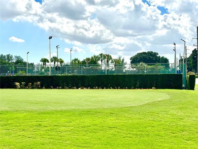 Enjoy relaxing garden  views from your screened in porch. The on Hollybrook Golf and Tennis Club  in Florida - for sale on GolfHomes.com, golf home, golf lot