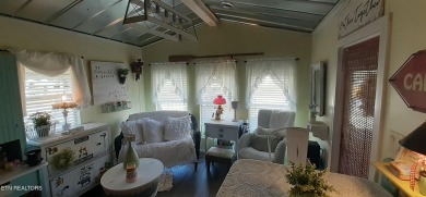 Lovely Cottage style living with 2 bedrooms, 2.5 baths! You must on Lake Tansi Village Country Club in Tennessee - for sale on GolfHomes.com, golf home, golf lot