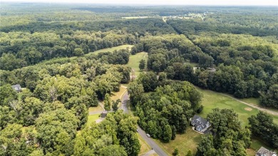 Nestled on the 17th fairway of Mill Quarter Golf Course, this on Mill Quarter Plantation Country Club in Virginia - for sale on GolfHomes.com, golf home, golf lot