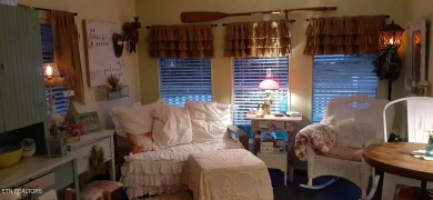 Lovely Cottage style living with 2 bedrooms, 2.5 baths! You must on Lake Tansi Village Country Club in Tennessee - for sale on GolfHomes.com, golf home, golf lot