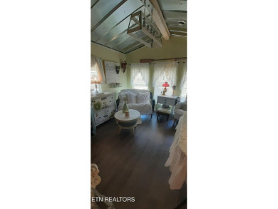 Lovely Cottage style living with 2 bedrooms, 2.5 baths! You must on Lake Tansi Village Country Club in Tennessee - for sale on GolfHomes.com, golf home, golf lot