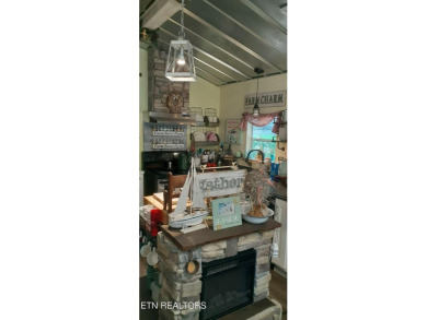 Lovely Cottage style living with 2 bedrooms, 2.5 baths! You must on Lake Tansi Village Country Club in Tennessee - for sale on GolfHomes.com, golf home, golf lot