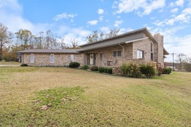 Nice brick home in a quiet neighborhood just outside city on Dawn Hill Country Club in Arkansas - for sale on GolfHomes.com, golf home, golf lot