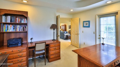 Contemporary, two story brick home has elegance and style on Spruce Creek Golf Club in Florida - for sale on GolfHomes.com, golf home, golf lot