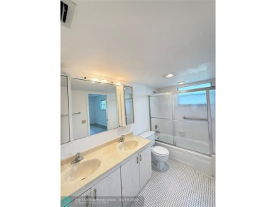 Do not miss this desirable FIRST floor corner unit. This unit is on Wynmoor Golf Course in Florida - for sale on GolfHomes.com, golf home, golf lot
