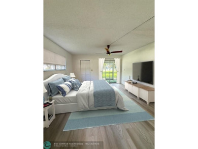 Do not miss this desirable FIRST floor corner unit. This unit is on Wynmoor Golf Course in Florida - for sale on GolfHomes.com, golf home, golf lot