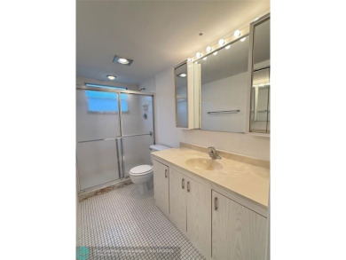 Do not miss this desirable FIRST floor corner unit. This unit is on Wynmoor Golf Course in Florida - for sale on GolfHomes.com, golf home, golf lot