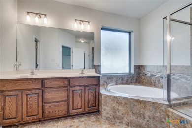 Discover the perfect blend of comfort and convenience in this on Plum Creek Golf Club in Texas - for sale on GolfHomes.com, golf home, golf lot