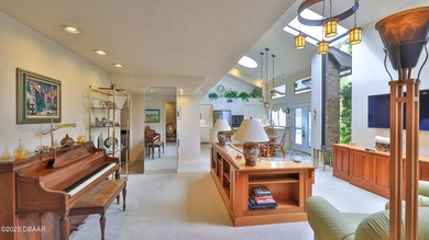 Contemporary, two story brick home has elegance and style on Spruce Creek Golf Club in Florida - for sale on GolfHomes.com, golf home, golf lot