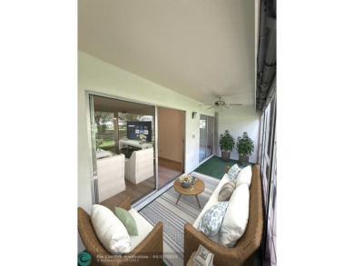 Do not miss this desirable FIRST floor corner unit. This unit is on Wynmoor Golf Course in Florida - for sale on GolfHomes.com, golf home, golf lot