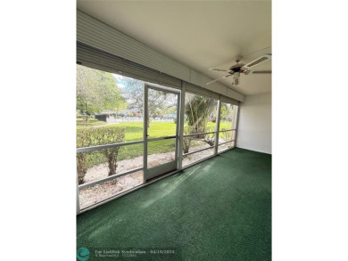 Do not miss this desirable FIRST floor corner unit. This unit is on Wynmoor Golf Course in Florida - for sale on GolfHomes.com, golf home, golf lot