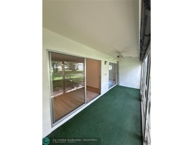 Do not miss this desirable FIRST floor corner unit. This unit is on Wynmoor Golf Course in Florida - for sale on GolfHomes.com, golf home, golf lot
