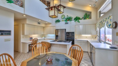 Contemporary, two story brick home has elegance and style on Spruce Creek Golf Club in Florida - for sale on GolfHomes.com, golf home, golf lot