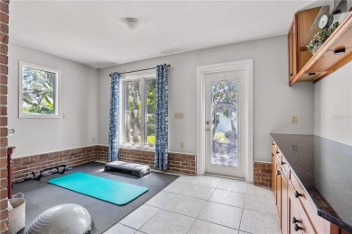 Welcome to your new home in one of Dunedin's premier on The Dunedin Country Club in Florida - for sale on GolfHomes.com, golf home, golf lot