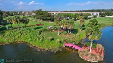 Do not miss this desirable FIRST floor corner unit. This unit is on Wynmoor Golf Course in Florida - for sale on GolfHomes.com, golf home, golf lot