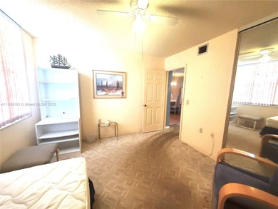 A hidden gem! Spacious 1,385 SF 2-bedroom, 2-bath unit with an on Pine Island Ridge Country Club in Florida - for sale on GolfHomes.com, golf home, golf lot