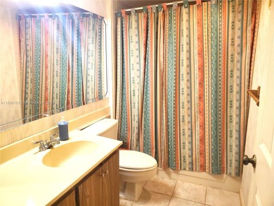 A hidden gem! Spacious 1,385 SF 2-bedroom, 2-bath unit with an on Pine Island Ridge Country Club in Florida - for sale on GolfHomes.com, golf home, golf lot