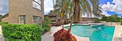 Contemporary, two story brick home has elegance and style on Spruce Creek Golf Club in Florida - for sale on GolfHomes.com, golf home, golf lot