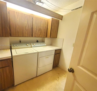 A hidden gem! Spacious 1,385 SF 2-bedroom, 2-bath unit with an on Pine Island Ridge Country Club in Florida - for sale on GolfHomes.com, golf home, golf lot