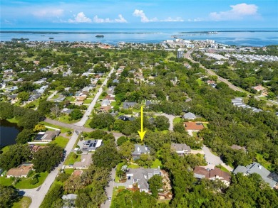Welcome to your new home in one of Dunedin's premier on The Dunedin Country Club in Florida - for sale on GolfHomes.com, golf home, golf lot