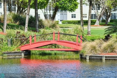 Do not miss this desirable FIRST floor corner unit. This unit is on Wynmoor Golf Course in Florida - for sale on GolfHomes.com, golf home, golf lot
