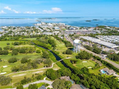 Welcome to your new home in one of Dunedin's premier on The Dunedin Country Club in Florida - for sale on GolfHomes.com, golf home, golf lot